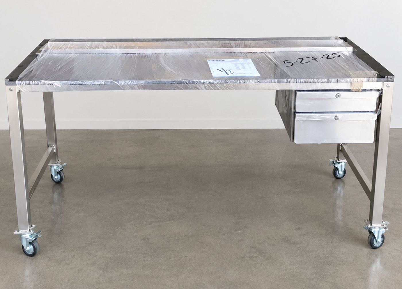 BenchPro Kennedy Series stainless steel cleanroom workbench, wrapped for storage